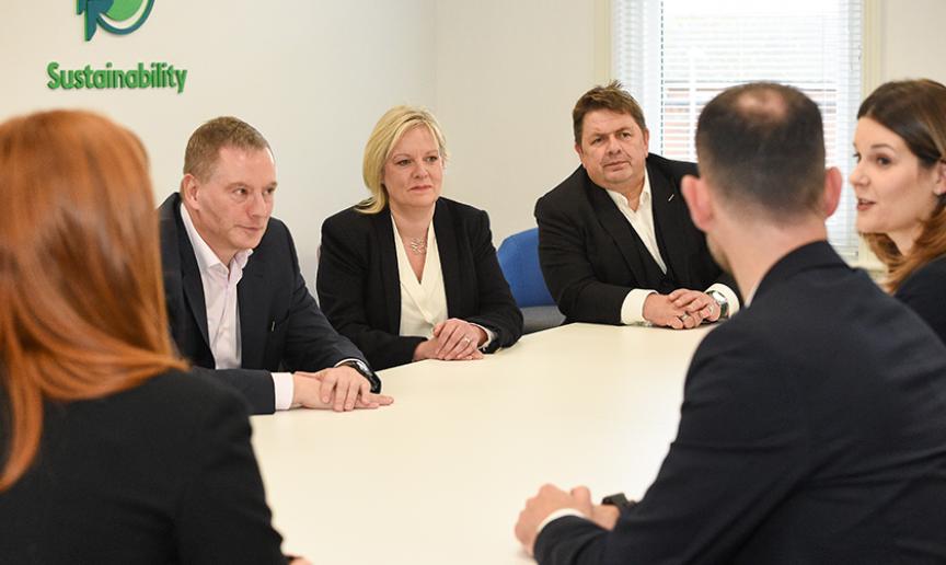 Members of Sanctuary's Executive board sitting around a wooden table